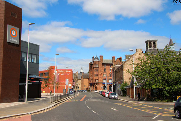 Main street of town of Govan with Glasgow underground station. Glasgow, Scotland.