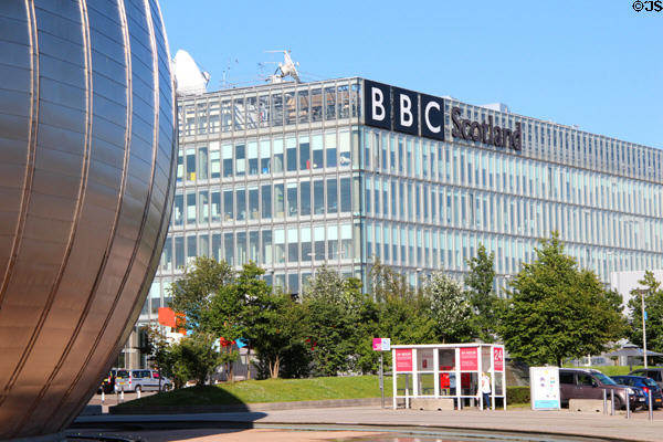 BBC Scotland (2001) at Pacific Quay beside silver Glasgow Science Centre. Glasgow, Scotland.