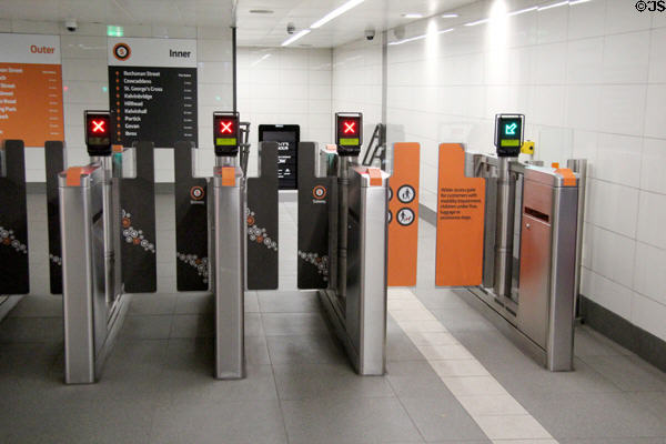 Entrance gates leading to Glasgow Subway. Glasgow, Scotland.