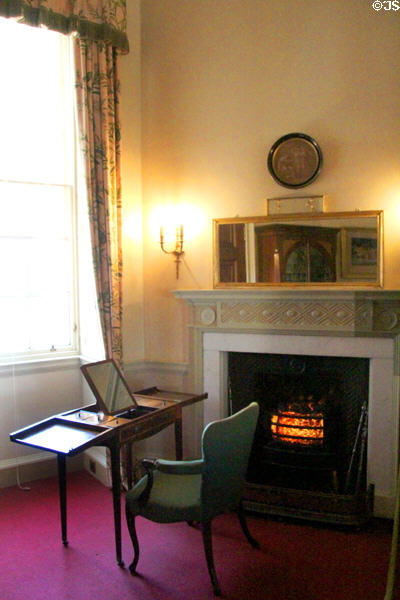 Table with built in mirror before Adamesque fireplace at Culzean Castle. Maybole, Scotland.