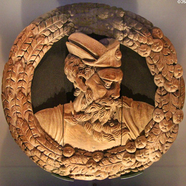 One of the nine worthies with fantastical headdress ring replica carving in Stirling Castle Palace gallery. Stirling, Scotland.