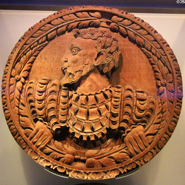 Fashionable courtier wearing slashed doublet ring replica carving in Stirling Castle Palace gallery. Stirling, Scotland.