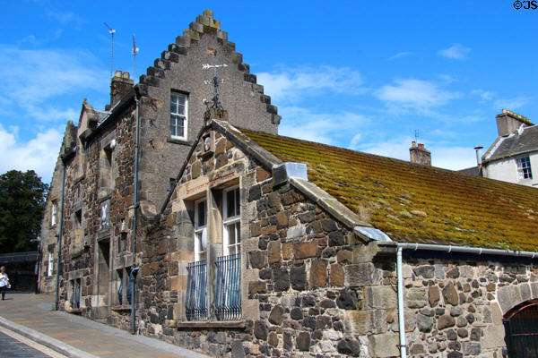 Heritage stone Boys Club building with "Quarrelling is Taboo" motto in Stirling old town. Stirling, Scotland.