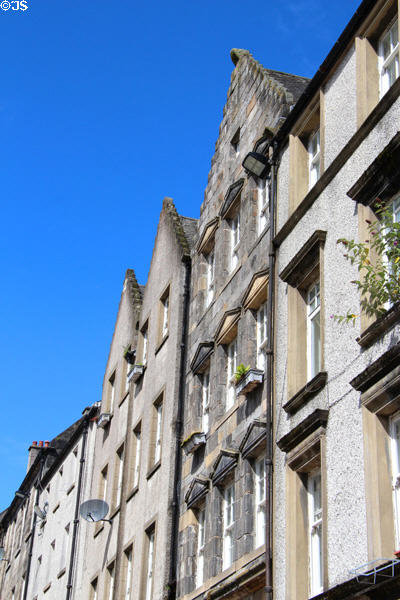 James Norie's House (1671) with carved stone wigged face of lawyer atop gable. Stirling, Scotland.