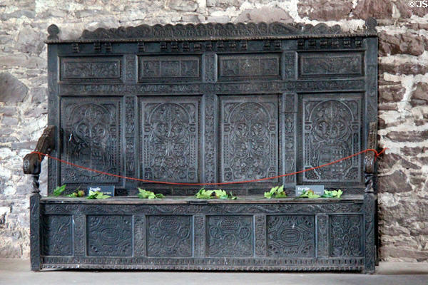 Carved bench in Great Hall at Doune Castle. Doune, Scotland.