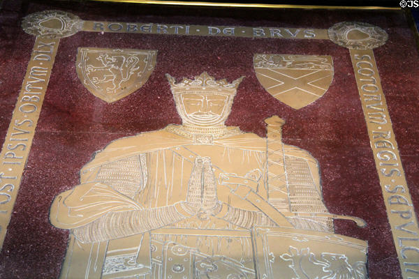 Detail of bronze visage of King Robert the Bruce tomb marker in Dunfermline New Abbey Church. Dunfermline, Scotland.