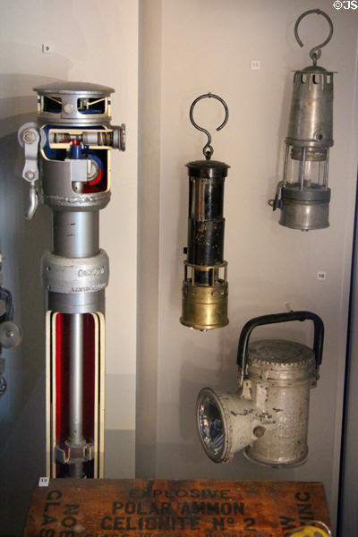 Mining lamps beside cutaway of exploder used to control mine detonations at Dunfermline Carnegie Library Museum. Dunfermline, Scotland.