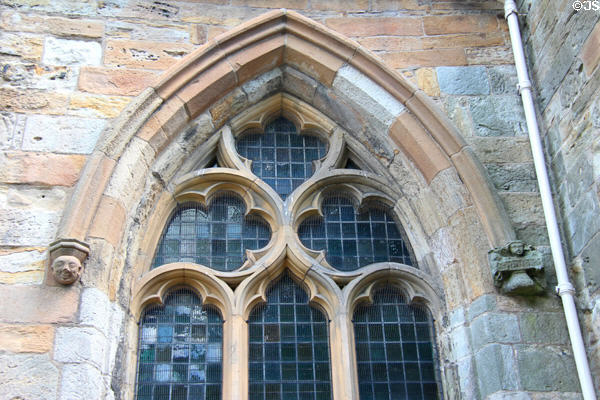 Carvings beside gothic window at Seton Collegiate Church. Seton, Scotland.