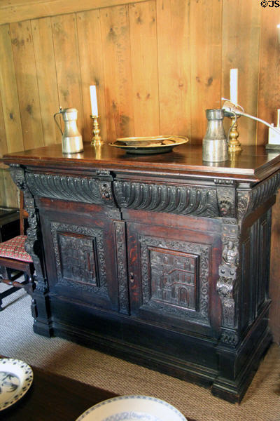 Carved cabinet with pewter Tappit Hen wine measures in High Hall at Culross Palace. Culross, Scotland.