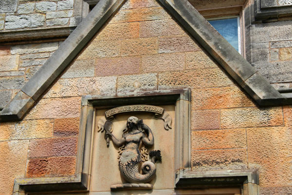 Relief "Per Mare per Terras", Rutherford coat of arms for the early 19thC owner, above entrance to Lauriston Castle. Edinburgh, Scotland.
