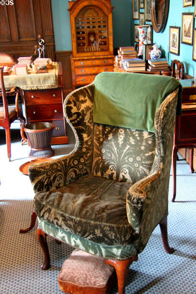 Easy chair & foot stool in Oak Room at Lauriston Castle. Edinburgh, Scotland.