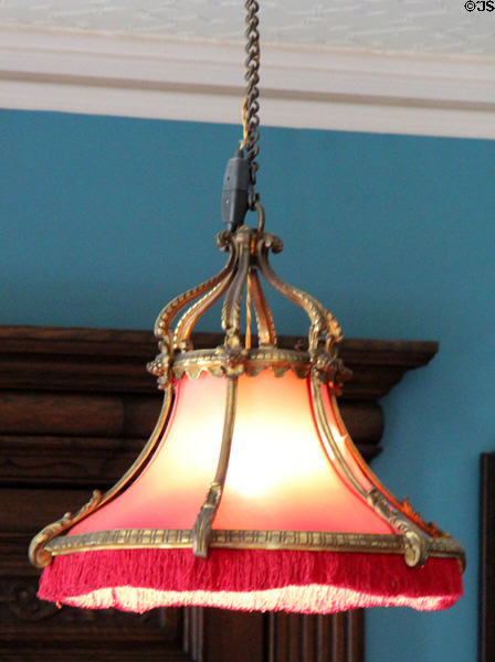 Hanging ceiling lamp with fringed shade in Oak Room at Lauriston Castle. Edinburgh, Scotland.