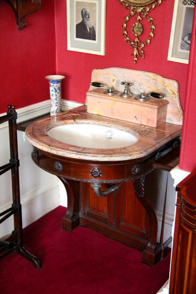 Corner sink with running water, replacing traditional basin & pitcher, in main bedroom at Lauriston Castle. Edinburgh, Scotland.
