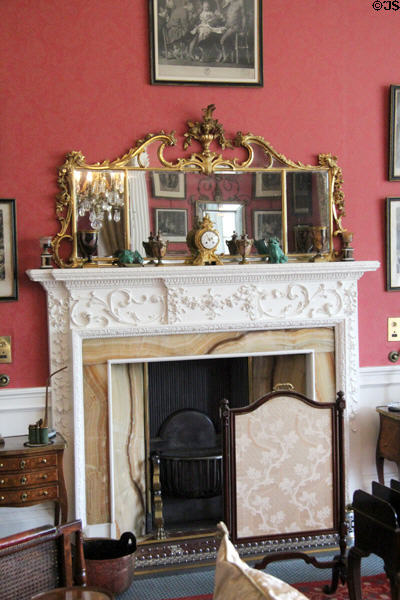 Fireplace with adamesque mantel in sitting room at Lauriston Castle. Edinburgh, Scotland.