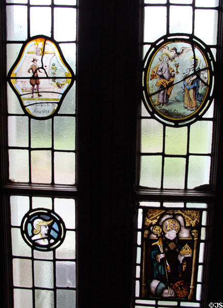 Stained glass insets in hallway windows at Lauriston Castle. Edinburgh, Scotland.