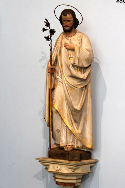 Carved St Joseph with lilies on staff in chapel at Abbotsford House. Melrose, Scotland.