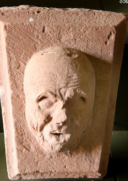 Carved stone keystone with face at Dryburgh Abbey. Scotland.