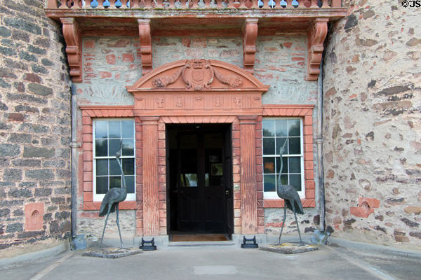 Entry portal flanked by bronze cranes at Thirlestane Castle. Scotland.