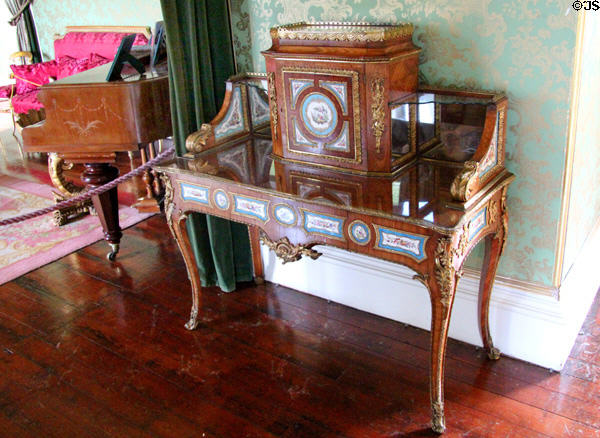 French Empire desk with porcelain inlays in large drawing room at Thirlestane Castle. Scotland.
