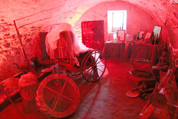 Cellar room displaying spooky objects at Traquair House. Scotland.