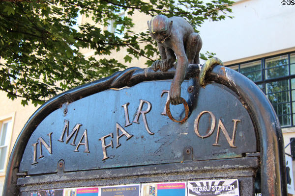 Bronze monkey on "In Ma Fair Toon" sculpture by Angela Hunter on High Street. Dundee, Scotland.