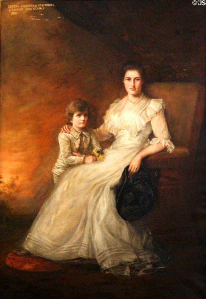 Family portrait of mother & child in dining room at Glamis Castle. Angus, Scotland.