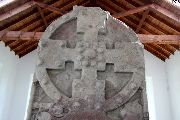 Pictish cross-slab (front of #2) detail embossed like studded metal crosses of the era at Meigle Sculptured Stone Museum. Meigle, Scotland.