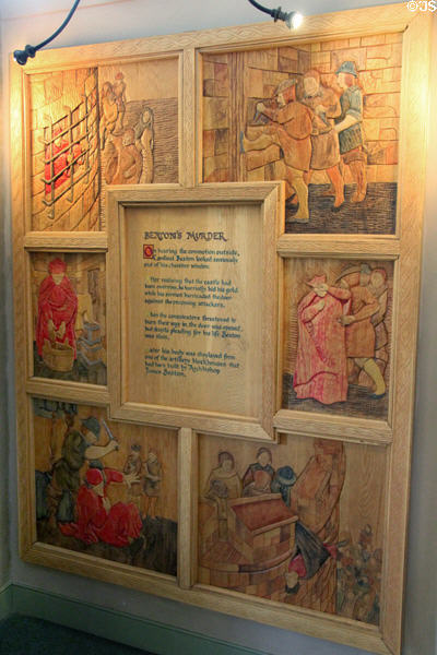 Modern carved plaque with history of murder of Cardinal Beaton at St Andrews Castle. St Andrews, Scotland.