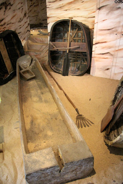 Reconstruction of Scottish dug-out boat (500) from Ayrshire & early fishing implements at Scottish Fisheries Museum. Anstruther, Scotland.