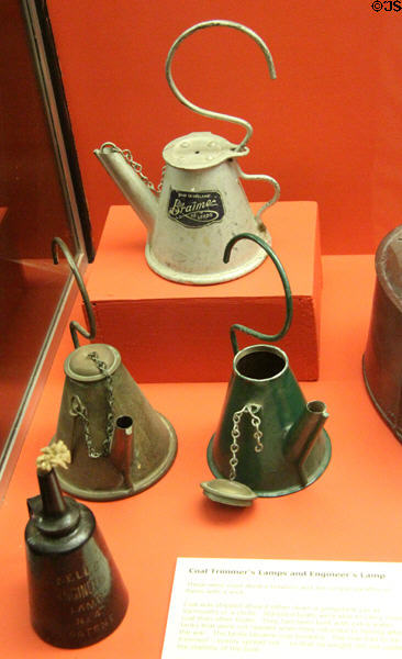 Coal trimmer's plus engineer's lamps which burned paraffin oil used aboard trawlers to spread coal bunkers aboard trawlers at Scottish Fisheries Museum. Anstruther, Scotland.