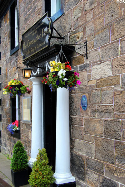 Covenanter Hotel (formerly Commercial Hotel) (1771) (High St.) with c1870 turret extension. Falkland, Scotland.