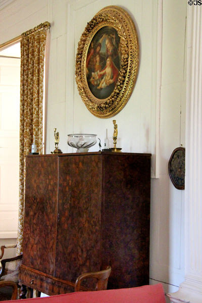 Dutch 18th C cabinet under religious painting in drawing room at Kellie Castle. Pittenweem, Scotland.