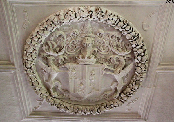 Heraldic panel framed by fruit commemorates marriage of 3red Earl of Kellie to Mary Dalzell in 1676 on ceiling in drawing room at Kellie Castle. Pittenweem, Scotland.