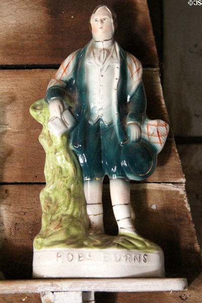 Robert Burns ceramic statuette in Highland cottage at Highland Folk Museum. Newtonmore, Scotland.