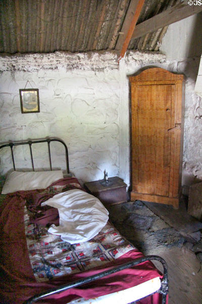 Bed & corner cabinet in Highland cottage at Highland Folk Museum. Newtonmore, Scotland.