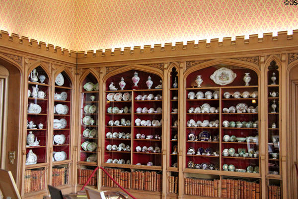 Bookcases displaying family's porcelain collection in library at Scone Palace. Perth, Scotland.