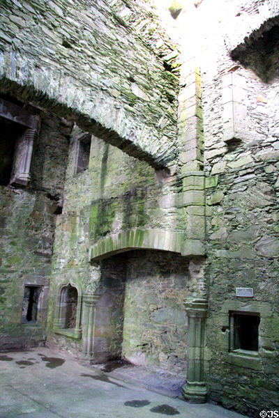 Fireplace & salt storage niche to right in Great hall of tower house at Cardoness Castle. Scotland.