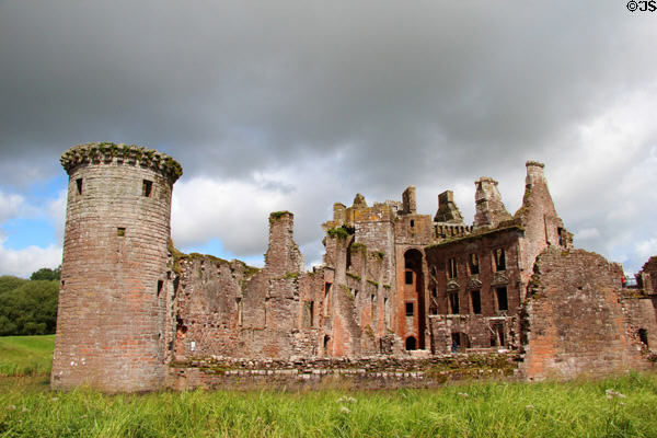 Caerlaverock Castle ruins sits in silted moat. Caerlaverock, Scotland.