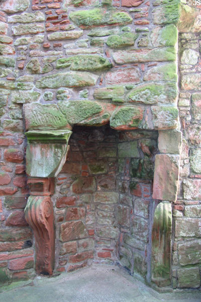 Sculpted fireplace in Nithsdale Lodging at Caerlaverock Castle. Caerlaverock, Scotland.