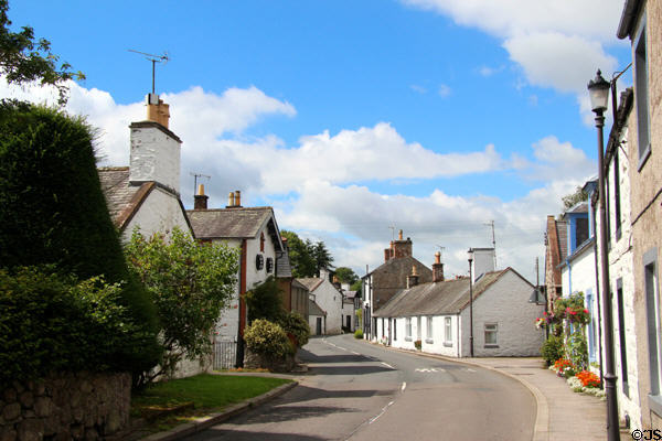 Main Street curves through New Abbey village. New Abbey, Scotland.