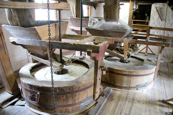 Grinding wheels at New Abbey Corn Mill. New Abbey, Scotland.