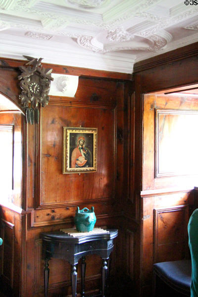 Walls of Baltic pine stained with oxblood in ladies withdrawing room at Craigievar Castle. Alford, Scotland.