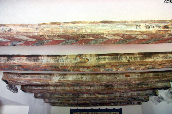 Painted ceiling beams with biblical text in stair chamber at Crathes Castle. Crathes, Scotland.