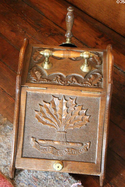 Victorian oak coal box with Irvine motto & crest of oak leaves since oak was main crop of estate at Drum Castle. Drumoak, Scotland.