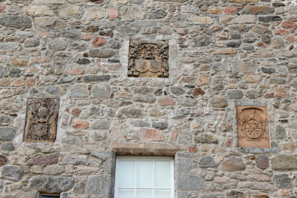 Arms of Frasers dated 1576, 1683 & 1795 on facade of Castle Fraser. Aberdeenshire, Scotland.