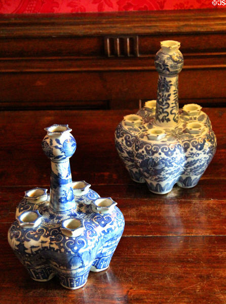 Blue ceramic sectional flower vases in dining room at Fyvie Castle. Turriff, Scotland.