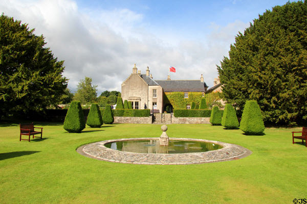 Pitmedden Garden (c1675) with house c1860 which replaced original destroyed by fire. Pitmedden, Scotland.