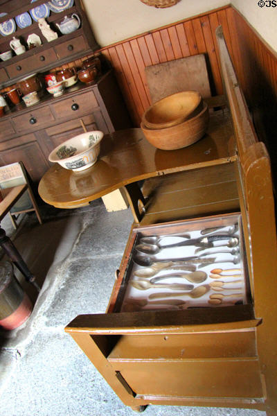 Farmhouse kitchen bench with fold down center table at Pitmedden Garden. Pitmedden, Scotland.