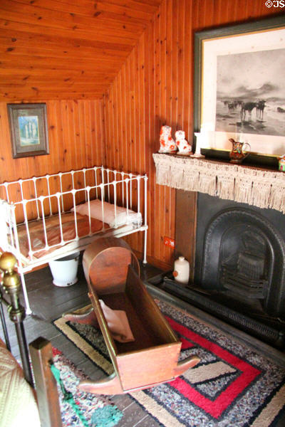 Farmhouse bedroom with cradle & child's bed at Pitmedden Garden. Pitmedden, Scotland.
