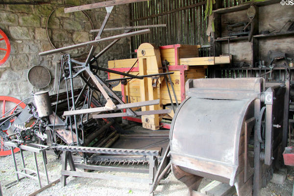 Reaper & binder in Museum of Farming Life at Pitmedden Garden. Pitmedden, Scotland.